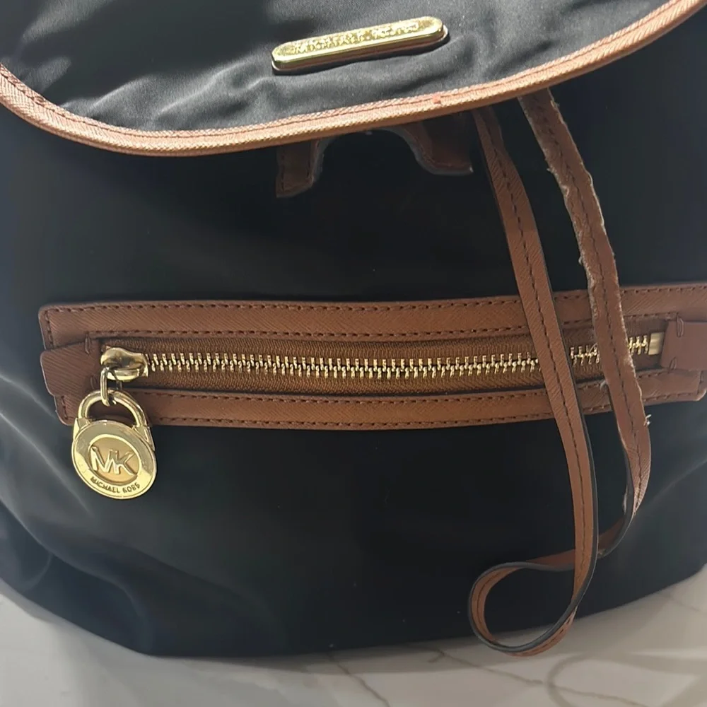 Michael Kors Black and Tan Backpack with Leather Accents